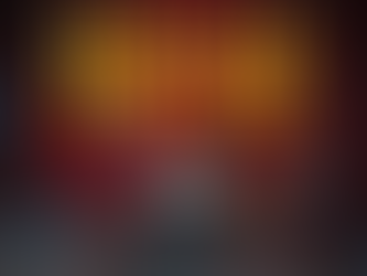 Rogue Fortune game logo with a skull pierced by a spear and crossed swords on a dark red background.