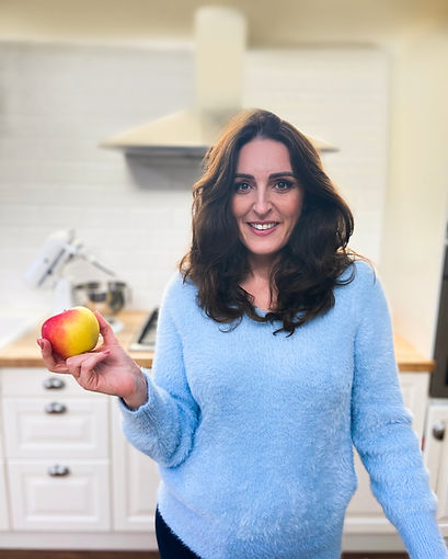 Jemma holding apple edited jpg.jpg