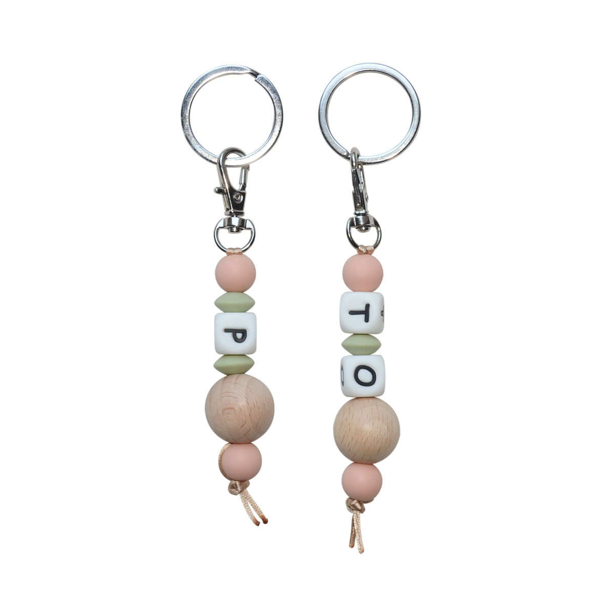 Llaveros Musk personalizados con iniciales en color melocotón - Accesorios para bebé