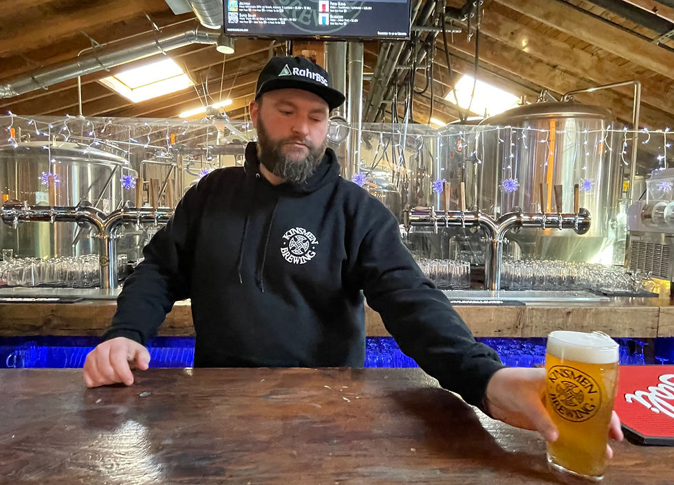 Jonas Griggs behind the bar in the taproom PHILIP THIBODEAU PHOTOS