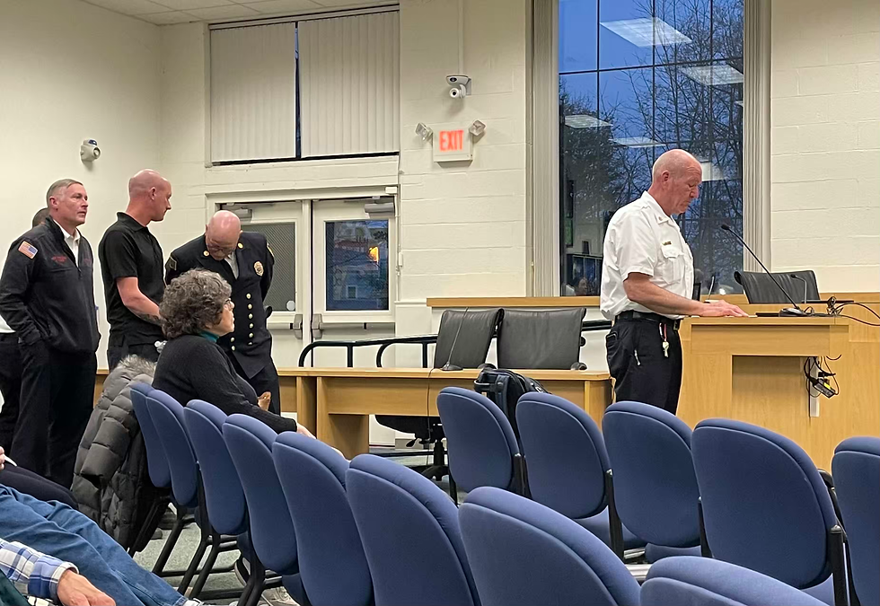 Chief Lee at the podium