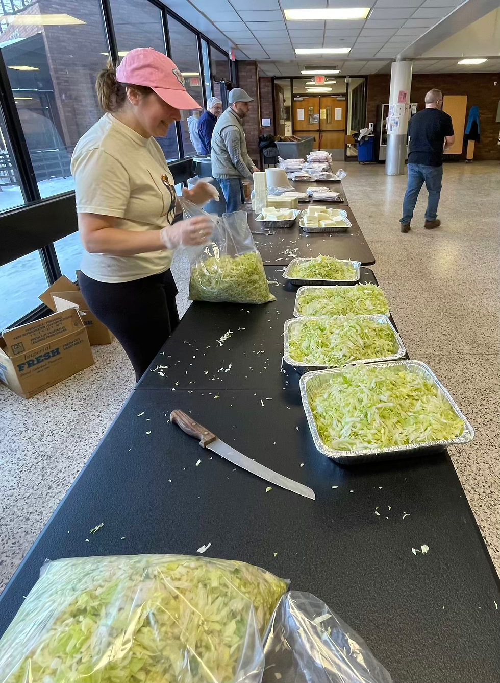 Bethany Rosin keeps the lettuce supply ready.			PHILIP THIBODEAU PHOTOS