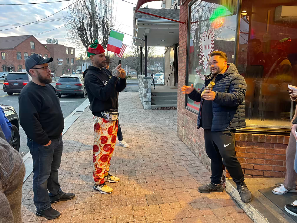 Shane photographs Nonna's manager Ace Memeti as he holds his trophy.