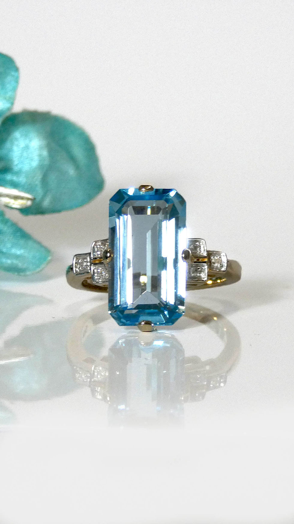 Thumbnail: Elongated Emerald Cut Blue Topaz & Diamond Ring