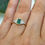 Thumbnail: Emerald Cut Rub-Over Emerald & Diamond Ring