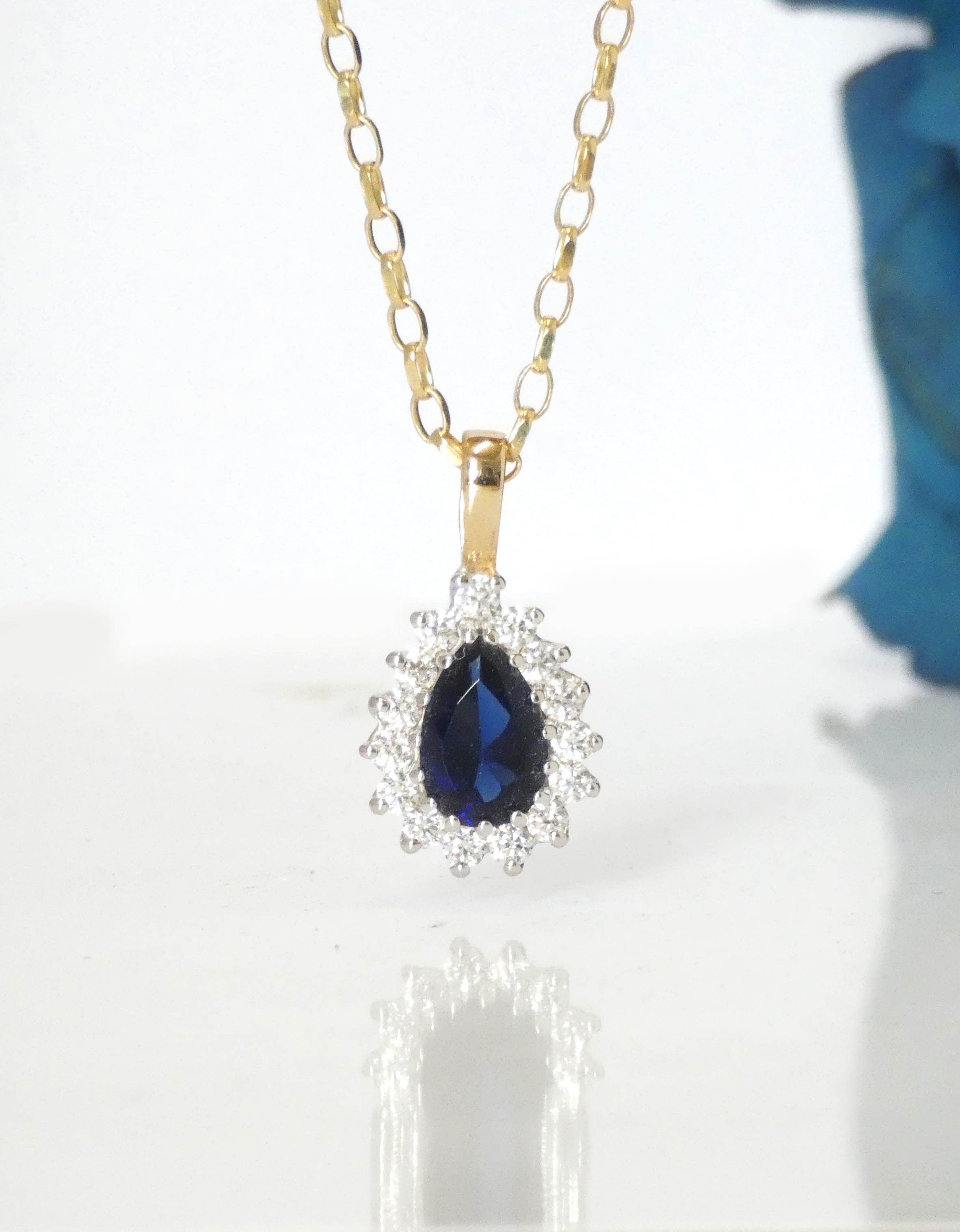 Pear Shape Created Sapphire & CZ Cluster Pendant