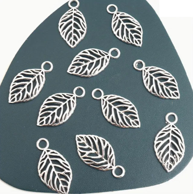 Thumbnail: Vintage Hollowed-out Textured Leaves Necklace in Bronze & Silvery