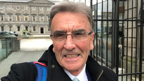 Photograph of the author of the article, Frank Brehany, standing outside the Oireachtas (the Irish Parliament in Dublin) after visiting to advocate for Magdalene Rights