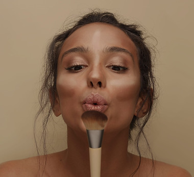 Woman with Makeup Brush_edited.jpg