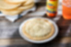 8. Arepa frita con queso derretido