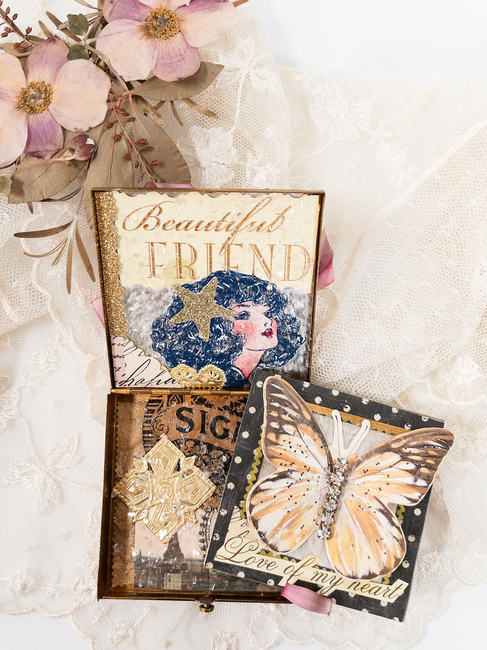 Inside heirloom vintage compact shown above, assorted images and words "Beautiful Friend" and "Love of my heart" - glitter, rhinestones, 3-D butterfly card