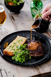 A delectable plate of traditional Welsh dishes served at The Golden Lion in Newport