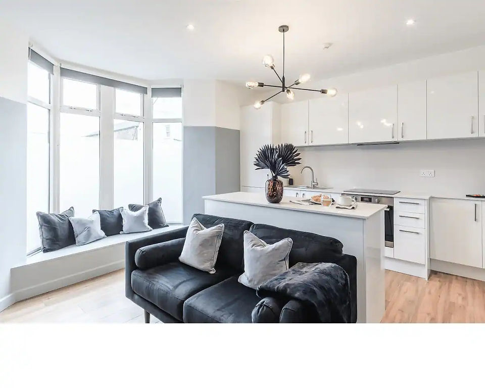 An inviting and stylish interior of an AirFreedom accommodation, featuring modern furnishings and ample natural light
