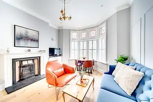 Open-plan living and dining area in serviced apartment The Pontcanna Ruby