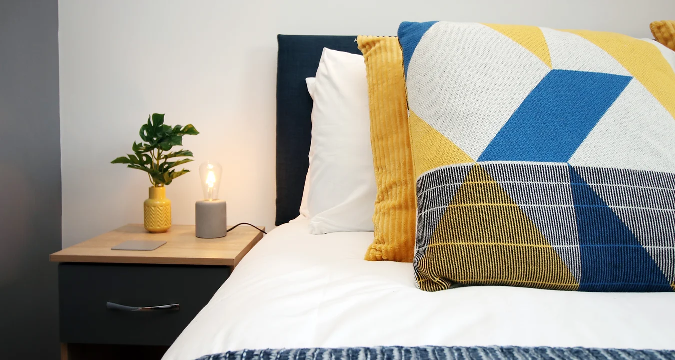 A comfortable bed in an AirFreedom accommodation in Bristol