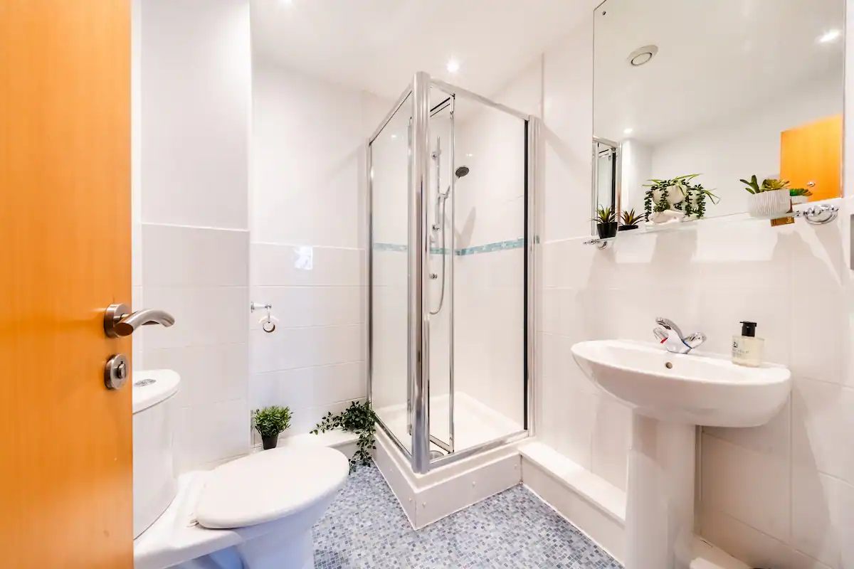 Modern bathroom in Marsh House, Bristol, with sleek fixtures, clean lines