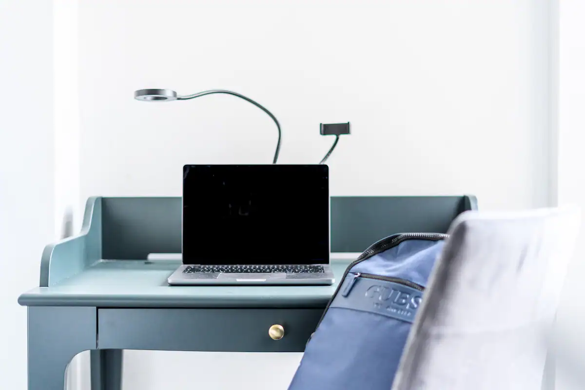 Workspace in Pontcanna Jewel: A sleek and functional desk area with a modern chair, positioned near a window to maximize natural light