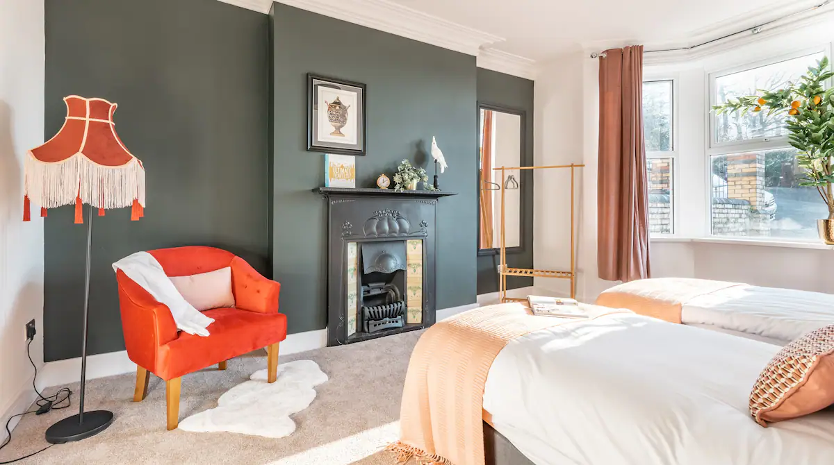 Bedroom at Kensington Place, featuring soft natural light, offering a serene and welcoming ambiance