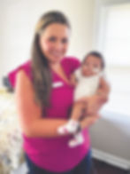 Executive Director Ale Lewis cradles a baby whose life was saved through Life On Wheels Birmingham, a visible reminder of the ministry’s mission to serve women, save babies, and share Jesus.