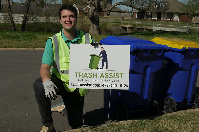 Trash Assist at Work, Marlan Rhame Founder Placing Sign