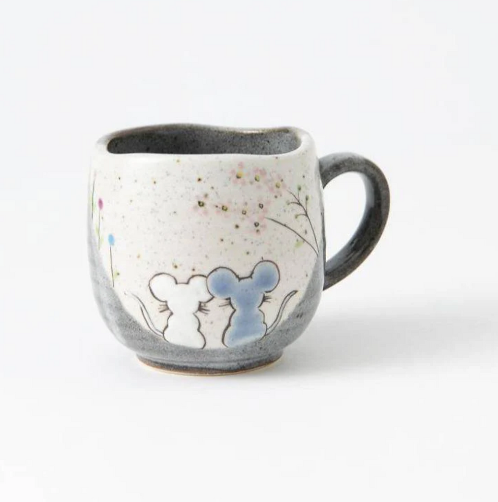 Thumbnail: Two mouse figures on coffee mug