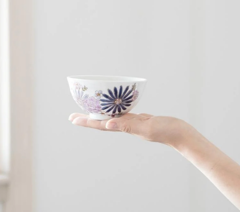 Thumbnail: Ble flower pattern ceramic bowl in palm
