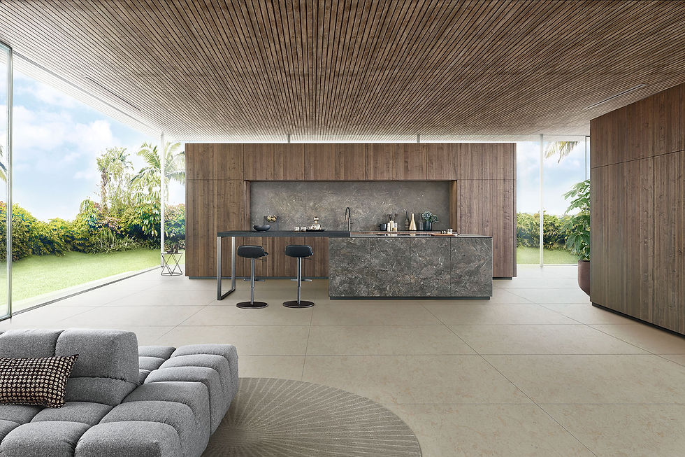Modern open concept kitchen with a seamless flow into the living space, featuring sleek cabinetry, ample natural light, and a spacious island for entertaining.