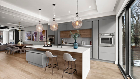 Modern | Side-by-side comparison of a traditional closed kitchen and a modern open concept kitchen, highlighting spaciousness and natural light.