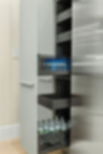 German pull-out pantry cabinet with interior storage organizers – efficient modern kitchen solution