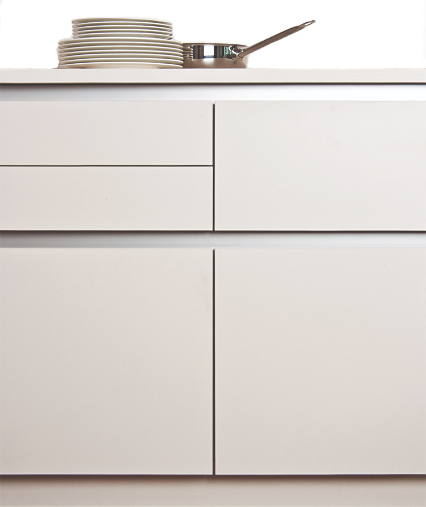 Contino modern handleless kitchen cabinetry featuring an integrated grip handle system, designed for a sleek, functional, and seamless aesthetic.