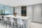 Modern Leicht kitchen with matte cabinetry, bold accents, and integrated tech