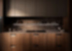 Integration of Handle in Dark Wood Veneer Kitchen Cabinets by Leicht – contemporary kitchen concept.