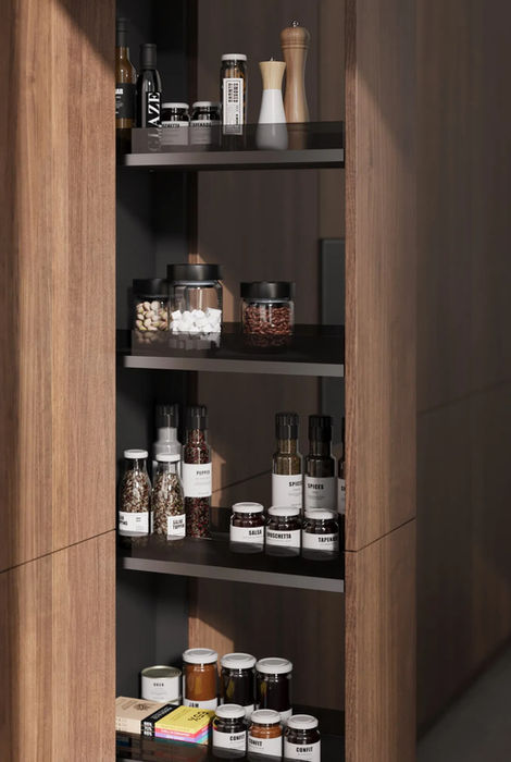 German engineered pull-out pantry cabinet interior with structured storage compartments by LEICHT