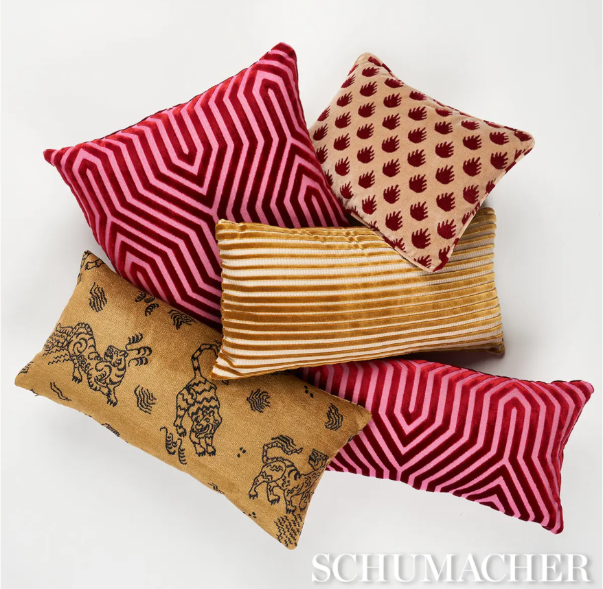 Schumacher cushions in fuchsia and gold velvets.