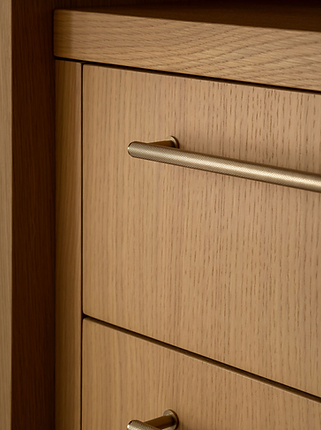 Rift-cut Oak Custom Cabinetry with luxuriously crafted Antique Brass Handles Designed By Robert Sweep Interiors.