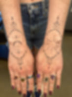 Ornamental style hand/wrist tattoo