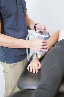 Visual representation of Electro-physical Modalities at our Hong Kong clinic: Shockwave therapy for tissue repair and pain relief, alongside laser therapy for inflammation reduction.