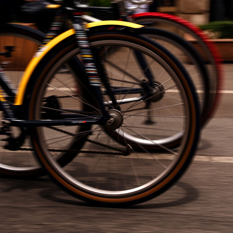 A close-up of bicycle wheels.