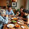 A multi-generational Asian family eating dinner.