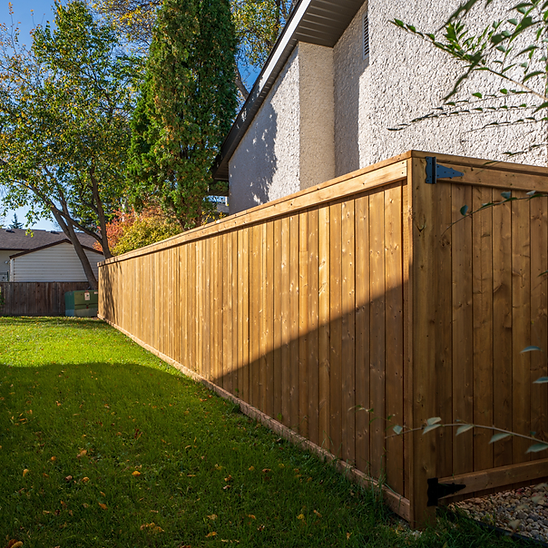 Wood fence in winnipeg by A+ Fences