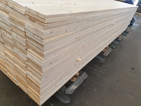 Close up view of a pack of machined Spruce timber namely a pack of 22x150 Planed Timber