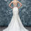 Thumbnail: A-line gown with off the shoulder illusion neckline and long sleeves, natural wa