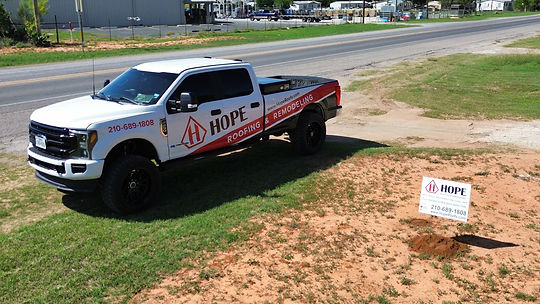 hope-roofing-truck-on-residential-roof-install.jpg