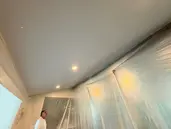 Kitchen and dining area protected during skylight installation