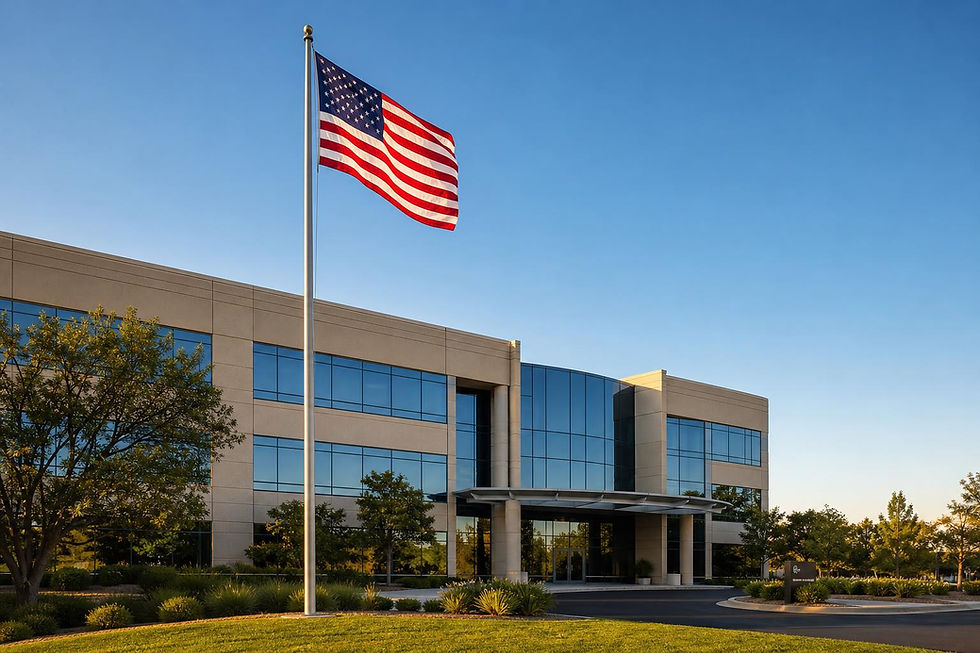 Modern multi-story commercial office building with an American flag out front