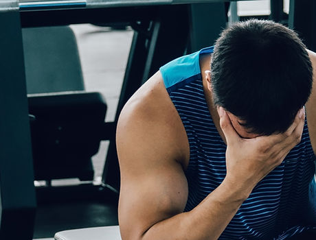 Tired%20man%20taking%20a%20workout%20rest.%20Male%20athlete%20suffering%20a%20headache%20or%20dizzin