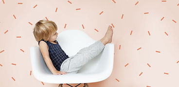 Boy Sitting on a Chair