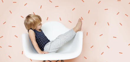 Boy Sitting on a Chair