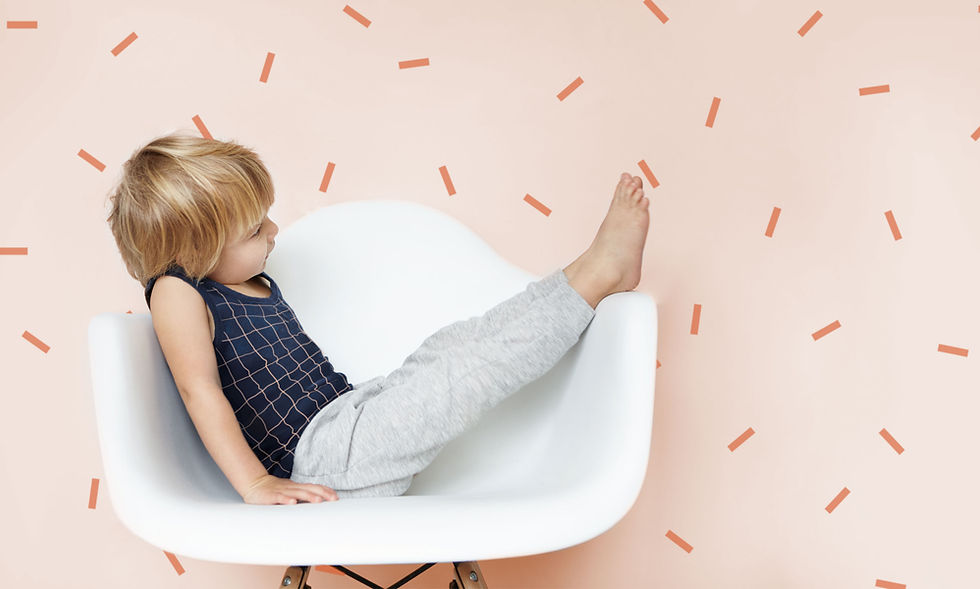 Boy Sitting on a Chair