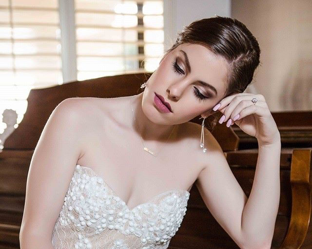 High angle view of an arrangement of bridal makeup products on a clean surface